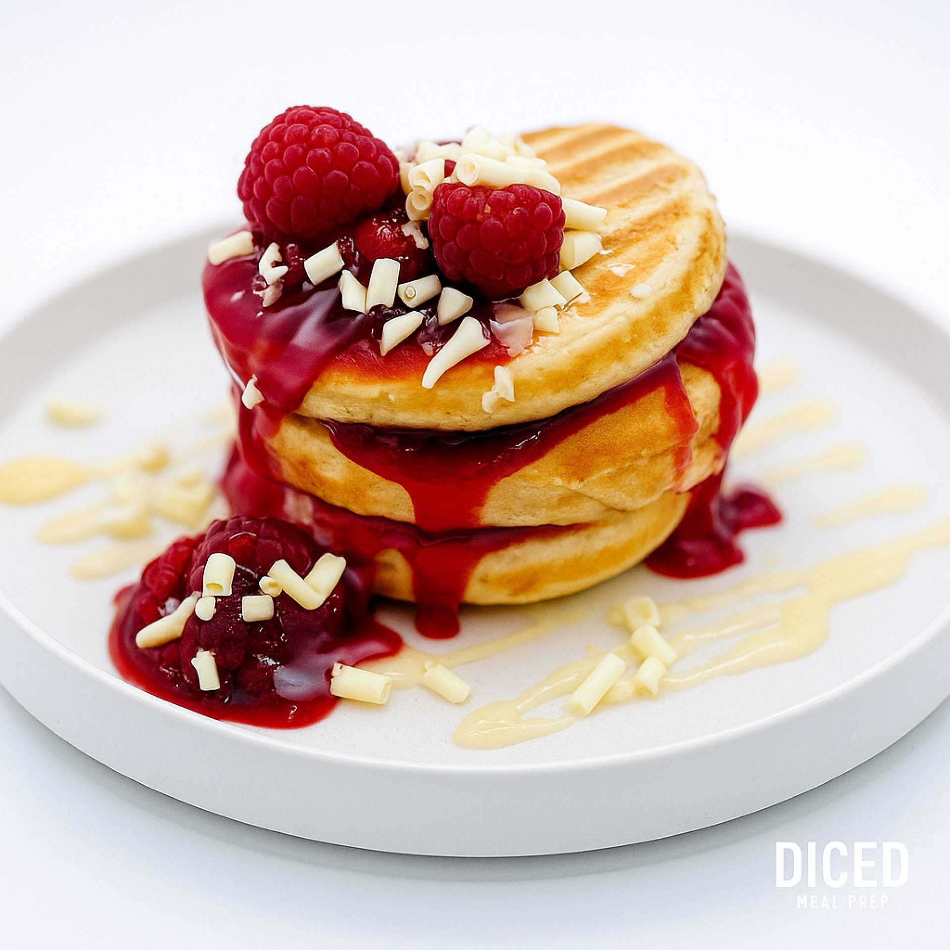 White Chocolate and Raspberry Protein Pancake Stack